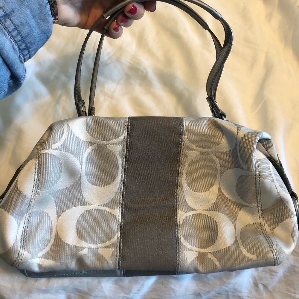 Silver coach purse